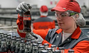 trabajar operario Coca Cola