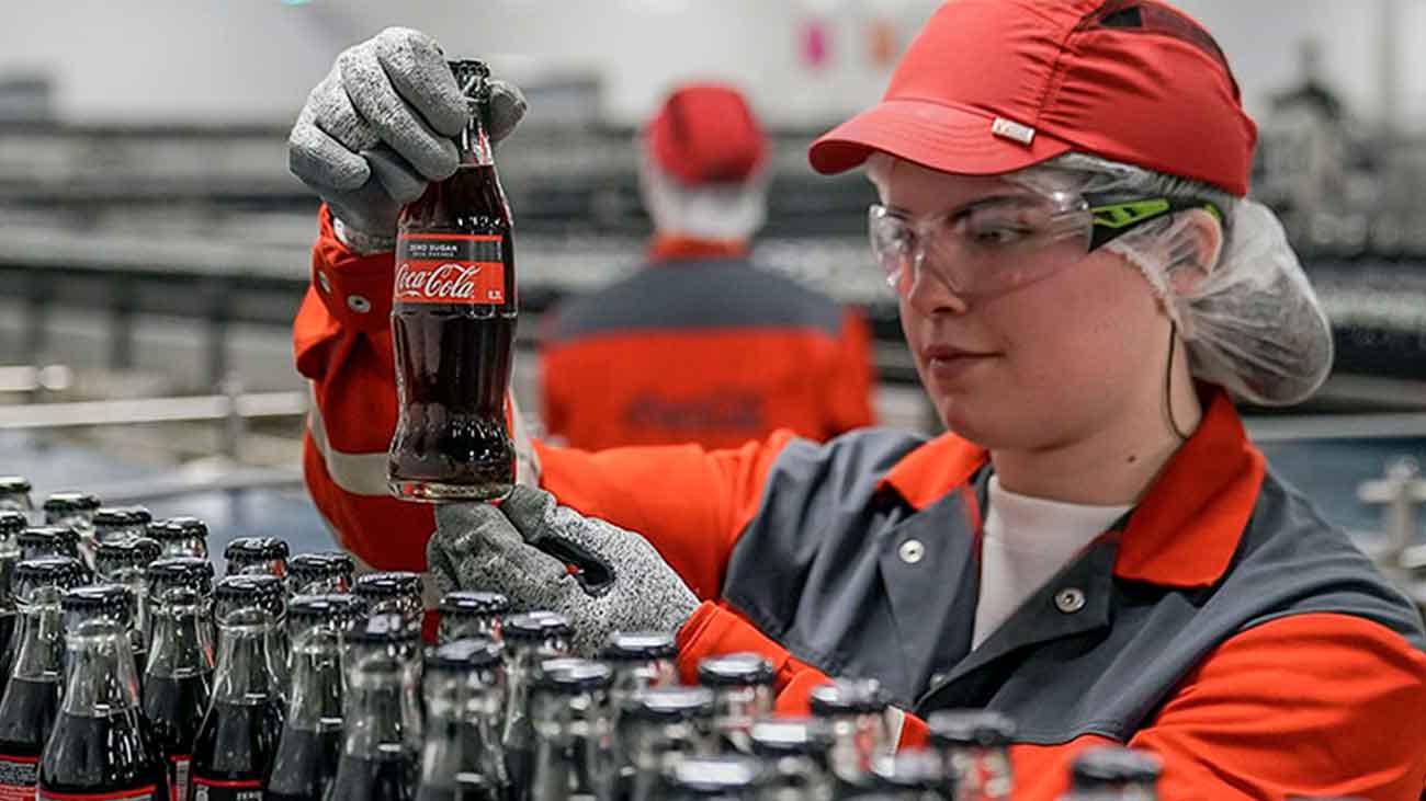 trabajar operario Coca Cola